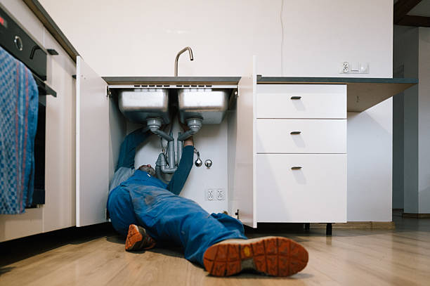 Professional Emergency Plumber technician working in Conesville, OH